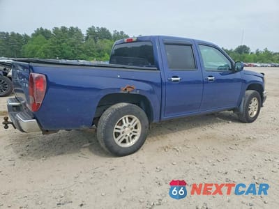 Trzecie zdjęcie samochodu z tyłu: 2011 GMC CANYON SLE VIN:1GTH6MFE0B8117013 - miniatura