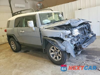 Czwarte zdjęcie samochodu z boku: 2014 TOYOTA FJ CRUISER BASE VIN:JTEBU4BF3EK186792 - miniatura
