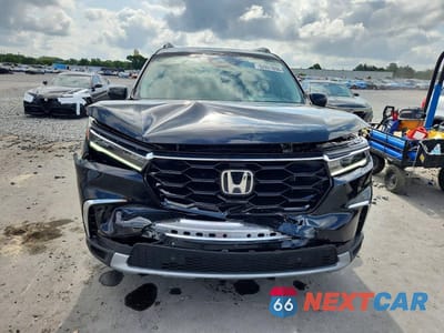 Piąte zdjęcie samochodu w środku: 2025 HONDA PILOT TOURING VIN:5FNYG2H7XSB037752 - miniatura