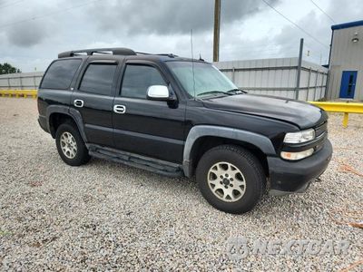 Czwarte zdjęcie samochodu z boku: 2003 CHEVROLET TAHOE K1500 VIN:1GNEK13TX3R302284 - miniatura