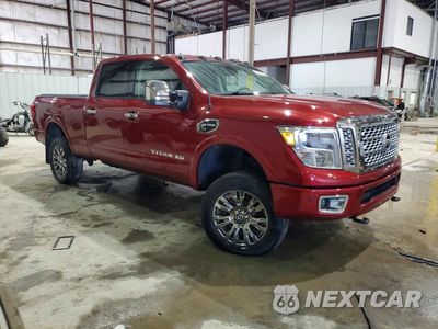 Czwarte zdjęcie samochodu z boku: 2016 NISSAN TITAN XD PLATINUM RESERVE VIN:1N6BA1F40GN515712 - miniatura