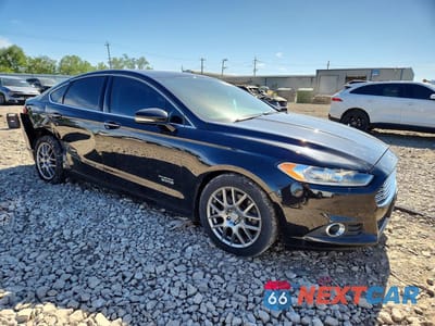 Czwarte zdjęcie samochodu z boku: 2016 FORD FUSION SE PHEV VIN:3FA6P0PU1GR373241 - miniatura