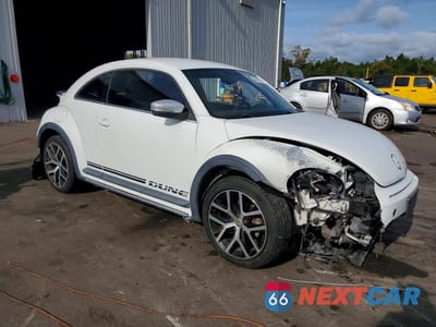 Czwarte zdjęcie samochodu z boku: 2016 VOLKSWAGEN BEETLE DUNE VIN:3VWS07AT2GM622100 - miniatura