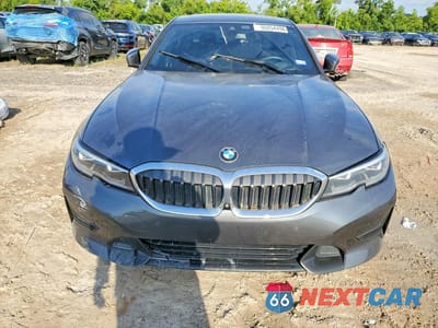 Piąte zdjęcie samochodu w środku: 2020 BMW 330I VIN:3MW5R1J07L8B39730 - miniatura