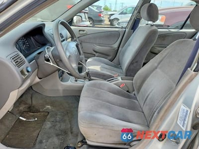 Zdjęcie 7 z 12 samochodu: 2001 TOYOTA COROLLA CE VIN:1NXBR12E31Z500978 - miniatura