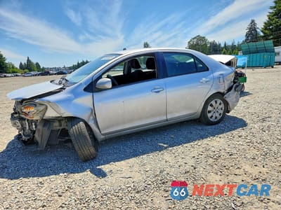 2009 TOYOTA YARIS BASE JTDBT903591311235 - główne zdjęcie licytacji z USA - miniatura