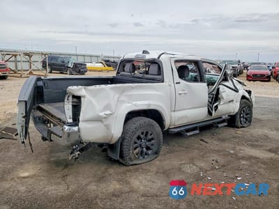 Trzecie zdjęcie samochodu z tyłu: 2023 TOYOTA TACOMA SR5 V6 VIN:3TYAZ5CN4PT039863 - miniatura
