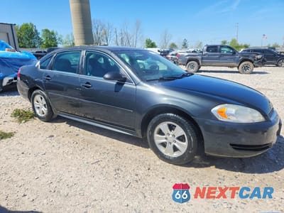 Czwarte zdjęcie samochodu z boku: 2013 CHEVROLET IMPALA LS VIN:2G1WF5E32D1215150 - miniatura