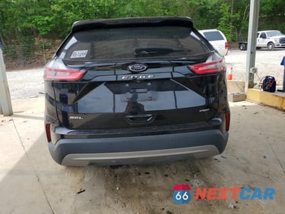 Zdjęcie 6 z 13 samochodu: 2021 FORD EDGE SEL VIN:2FMPK4J96MBA54013 - miniatura