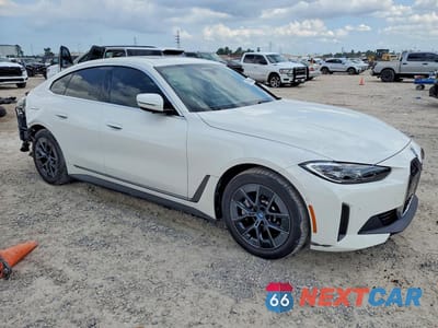Czwarte zdjęcie samochodu z boku: 2024 BMW I4 EDRIVE 35 VIN:WBY43AW07RFS36871 - miniatura