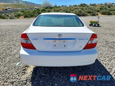 Zdjęcie 6 z 12 samochodu: 2002 TOYOTA CAMRY XLE V6 VIN:JTDBF30K420002122 - miniatura