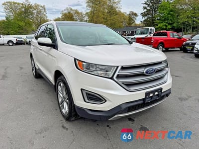 Czwarte zdjęcie samochodu z boku: 2018 FORD EDGE TITANIUM VIN:2FMPK4K86JBB66540 - miniatura