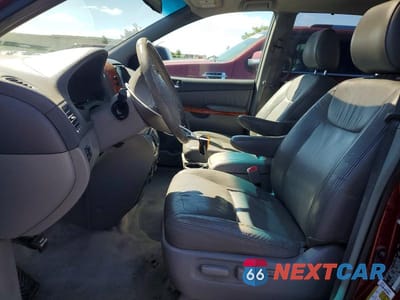 Zdjęcie 7 z 13 samochodu: 2010 TOYOTA SIENNA XLE VIN:5TDYK4CC7AS318304 - miniatura