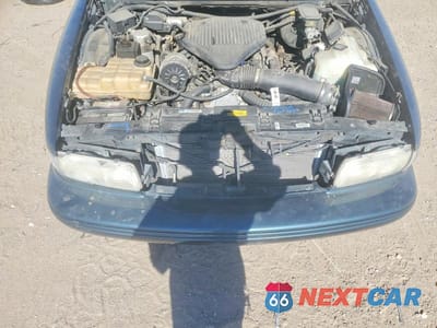 Zdjęcie 11 z 12 samochodu: 1996 CHEVROLET CAPRICE / IMPALA CLASSIC SS VIN:1G1BL52P3TR101727 - miniatura