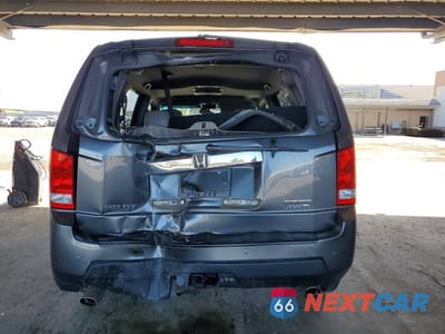 Zdjęcie 6 z 12 samochodu: 2011 HONDA PILOT TOURING VIN:5FNYF4H98BB009089 - miniatura