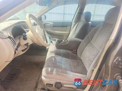 Zdjęcie 7 z 12 samochodu: 2003 CHEVROLET IMPALA VIN:2G1WF52E039123430 - miniatura