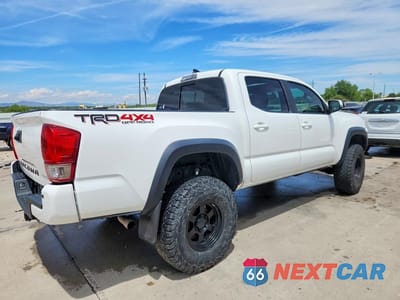Trzecie zdjęcie samochodu z tyłu: 2017 TOYOTA TACOMA TRD OFF-ROAD VIN:3TMCZ5AN7HM045620 - miniatura