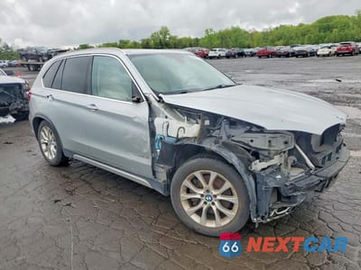 Czwarte zdjęcie samochodu z boku: 2015 BMW X5 XDRIVE50I VIN:5UXKR6C50F0J74425 - miniatura