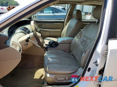 Zdjęcie 7 z 12 samochodu: 2000 TOYOTA AVALON XL VIN:4T1BF28B3YU013785 - miniatura