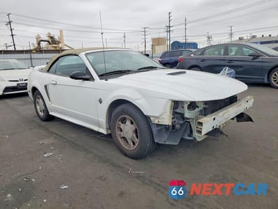 Czwarte zdjęcie samochodu z boku: 1999 FORD MUSTANG VIN:1FAFP4448XF148260 - miniatura