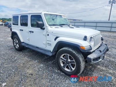 Czwarte zdjęcie samochodu z boku: 2019 JEEP WRANGLER UNLIMITED SAHARA VIN:1C4HJXENXKW520963 - miniatura