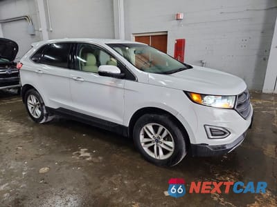 Czwarte zdjęcie samochodu z boku: 2017 FORD EDGE SEL VIN:2FMPK4J85HBC12824 - miniatura