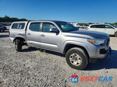 Czwarte zdjęcie samochodu z boku: 2017 TOYOTA TACOMA SR V6 VIN:3TMCZ5AN0HM066731 - miniatura