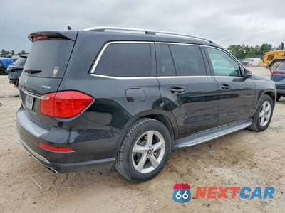 Trzecie zdjęcie samochodu z tyłu: 2014 MERCEDES-BENZ GL 450 4MATIC VIN:4JGDF7CE7EA440147 - miniatura