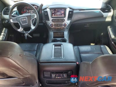 Zdjęcie 8 z 13 samochodu: 2015 GMC YUKON SLT VIN:1GKS2BKC3FR679860 - miniatura