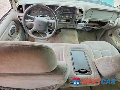 Zdjęcie 8 z 12 samochodu: 1999 GMC SIERRA K1500 VIN:1GTEK19R9XR502387 - miniatura
