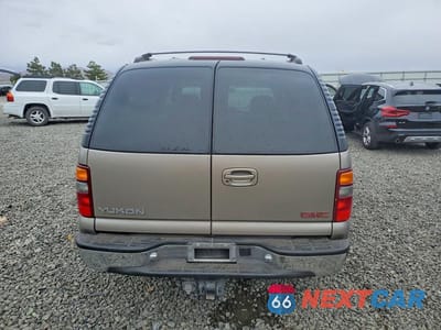 Zdjęcie 6 z 13 samochodu: 2001 GMC YUKON VIN:1GKEK13T11J265926 - miniatura