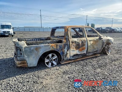 Trzecie zdjęcie samochodu z tyłu: 2013 RAM 1500 LARAMIE VIN:1C6RR7NT2DS507024 - miniatura