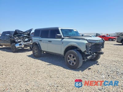 Czwarte zdjęcie samochodu z boku: 2022 FORD BRONCO BASE VIN:1FMDE5BH1NLB57055 - miniatura