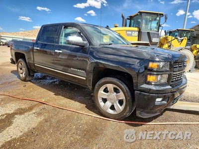 Czwarte zdjęcie samochodu z boku: 2015 CHEVROLET SILVERADO K1500 LT VIN:3GCUKREHXFG447020 - miniatura