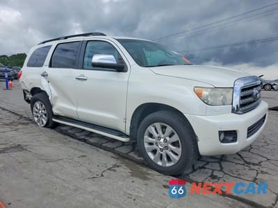 Czwarte zdjęcie samochodu z boku: 2014 TOYOTA SEQUOIA PLATINUM VIN:5TDYY5G14ES055806 - miniatura