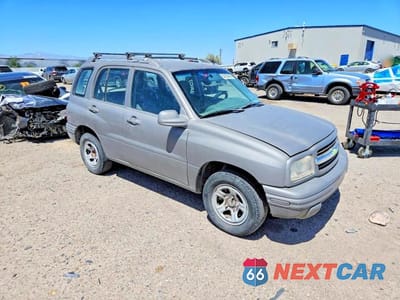 Czwarte zdjęcie samochodu z boku: 2000 CHEVROLET TRACKER VIN:2CNBE13C1Y6912768 - miniatura