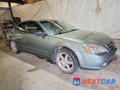 Czwarte zdjęcie samochodu z boku: 2002 NISSAN ALTIMA SE VIN:1N4BL11E62C198493 - miniatura