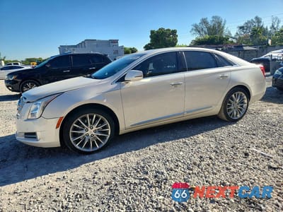 2013 CADILLAC XTS PLATINUM 2G61U5S34D9207065 - główne zdjęcie licytacji z USA - miniatura