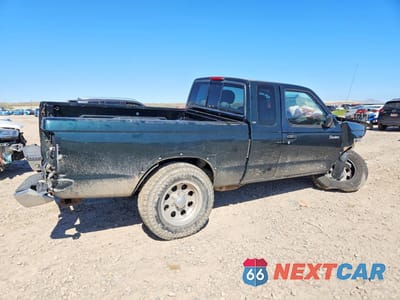 Trzecie zdjęcie samochodu z tyłu: 1999 NISSAN FRONTIER XE-V6 VIN:1N6ED26Y7XC324359 - miniatura