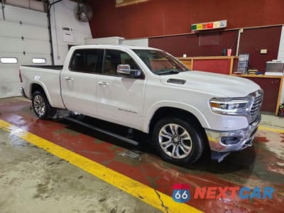 Czwarte zdjęcie samochodu z boku: 2020 RAM 1500 LONGHORN VIN:1C6SRFST3LN189041 - miniatura