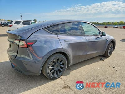 Trzecie zdjęcie samochodu z tyłu: 2023 TESLA MODEL Y VIN:7SAYGDEE9PA155622 - miniatura