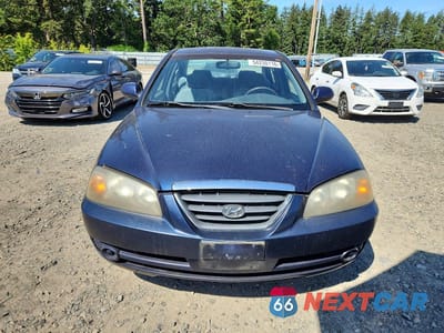 Piąte zdjęcie samochodu w środku: 2005 HYUNDAI ELANTRA GLS VIN:KMHDN46D95U097070 - miniatura