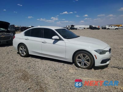 Czwarte zdjęcie samochodu z boku: 2017 BMW 330 I VIN:WBA8B9G30HNU56089 - miniatura