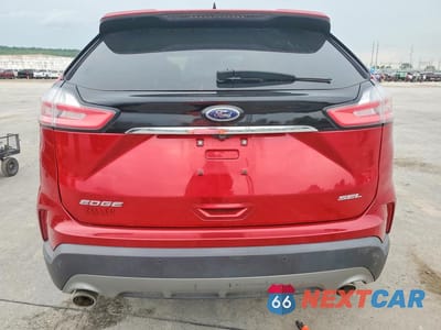 Zdjęcie 6 z 13 samochodu: 2020 FORD EDGE SEL VIN:2FMPK3J94LBB56077 - miniatura