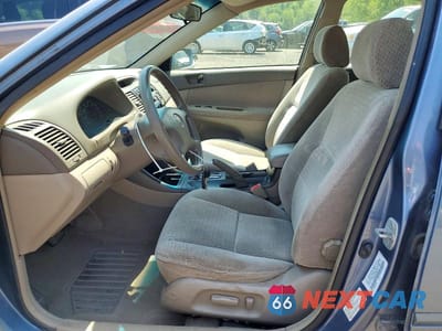 Zdjęcie 7 z 13 samochodu: 2002 TOYOTA CAMRY LE VIN:4T1BE32K02U564829 - miniatura