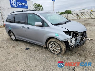 Czwarte zdjęcie samochodu z boku: 2016 TOYOTA SIENNA XLE 8-PASSENGER VIN:5TDYK3DCXGS738656 - miniatura