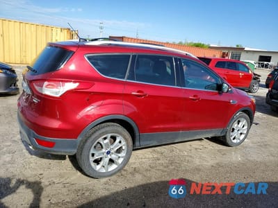 Trzecie zdjęcie samochodu z tyłu: 2016 FORD ESCAPE TITANIUM VIN:1FMCU9JX4GUC77900 - miniatura