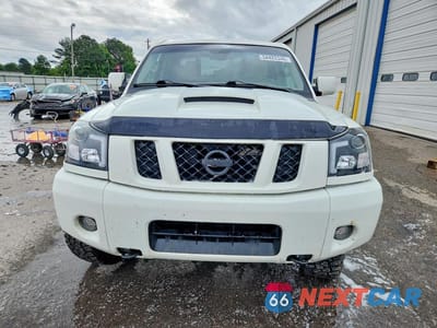 Piąte zdjęcie samochodu w środku: 2012 NISSAN TITAN SV VIN:1N6BA0ECXCN330984 - miniatura