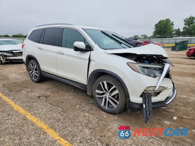 Czwarte zdjęcie samochodu z boku: 2018 HONDA PILOT TOURING VIN:5FNYF5H93JB007707 - miniatura