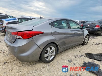 Trzecie zdjęcie samochodu z tyłu: 2012 HYUNDAI ELANTRA LIMITED VIN:KMHDH4AE1CU265773 - miniatura